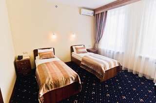 Отель Гостиница Виктория Уральск Стандартный двухместный номер с 2 отдельными кроватями-19
